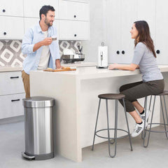 45L semi-round pedal bin with liner rim - brushed finish - lifestyle man and woman in kitchen