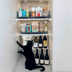 50.2cm pull-out cabinet organiser - lifestyle in cabinet with cat